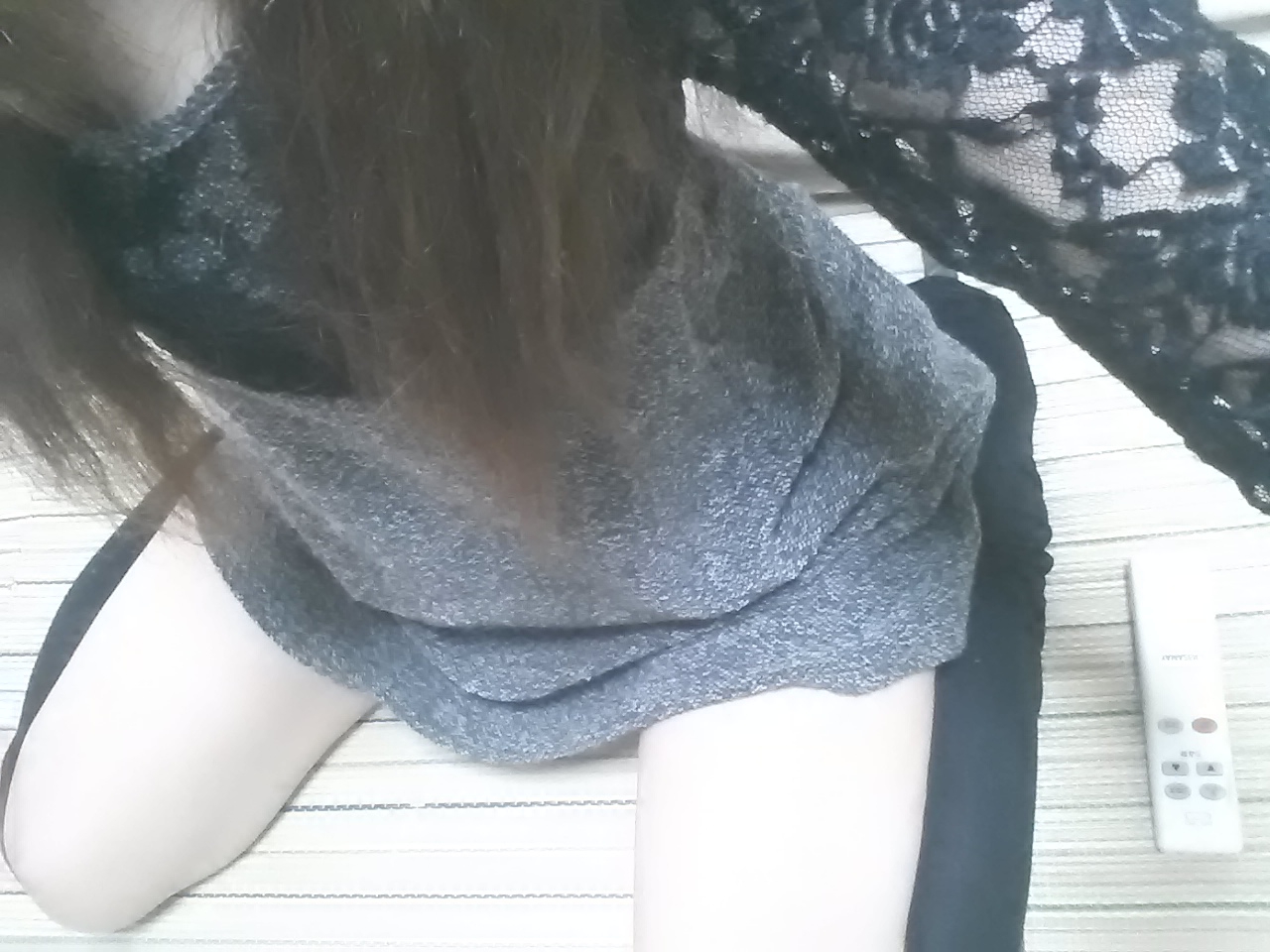 �߂���